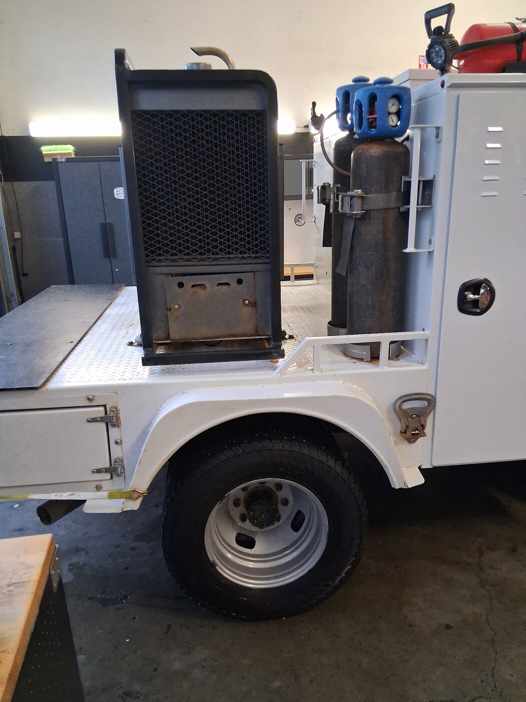 Service truck deck after — scrubbed back to clean white